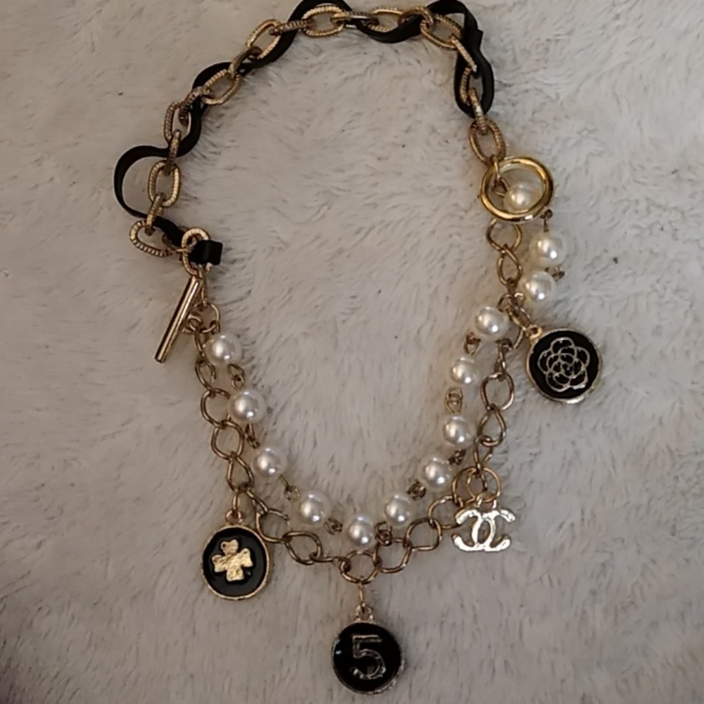 Cute gold toned triple chain charm bracelet
